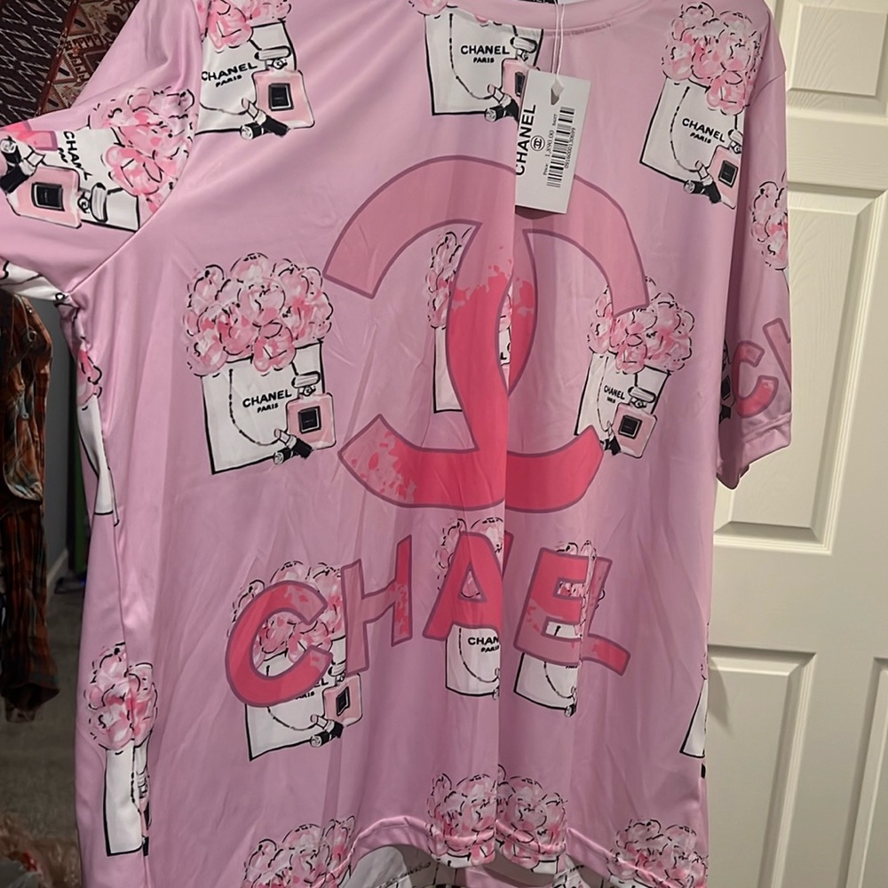 Chanel pink designer shirt.